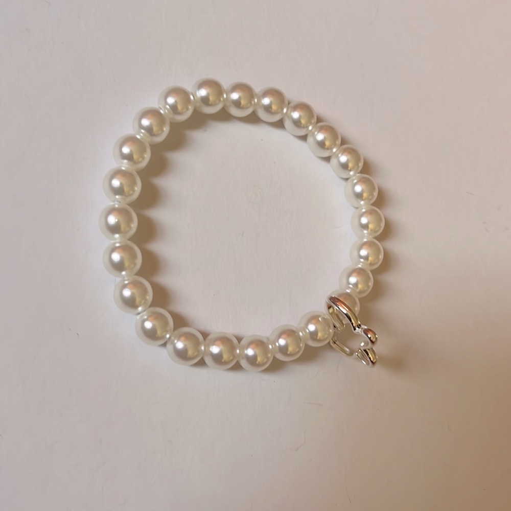 Pearl beaded bracelet with butterfly charm
